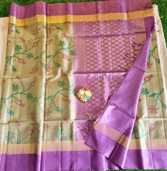 Soft silk light golden pista green colour all over kalamkari print saree with purple colour border and rich pallu