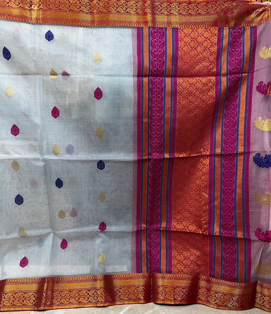 Pure muslin grey coloured saree with zari border and pallu
