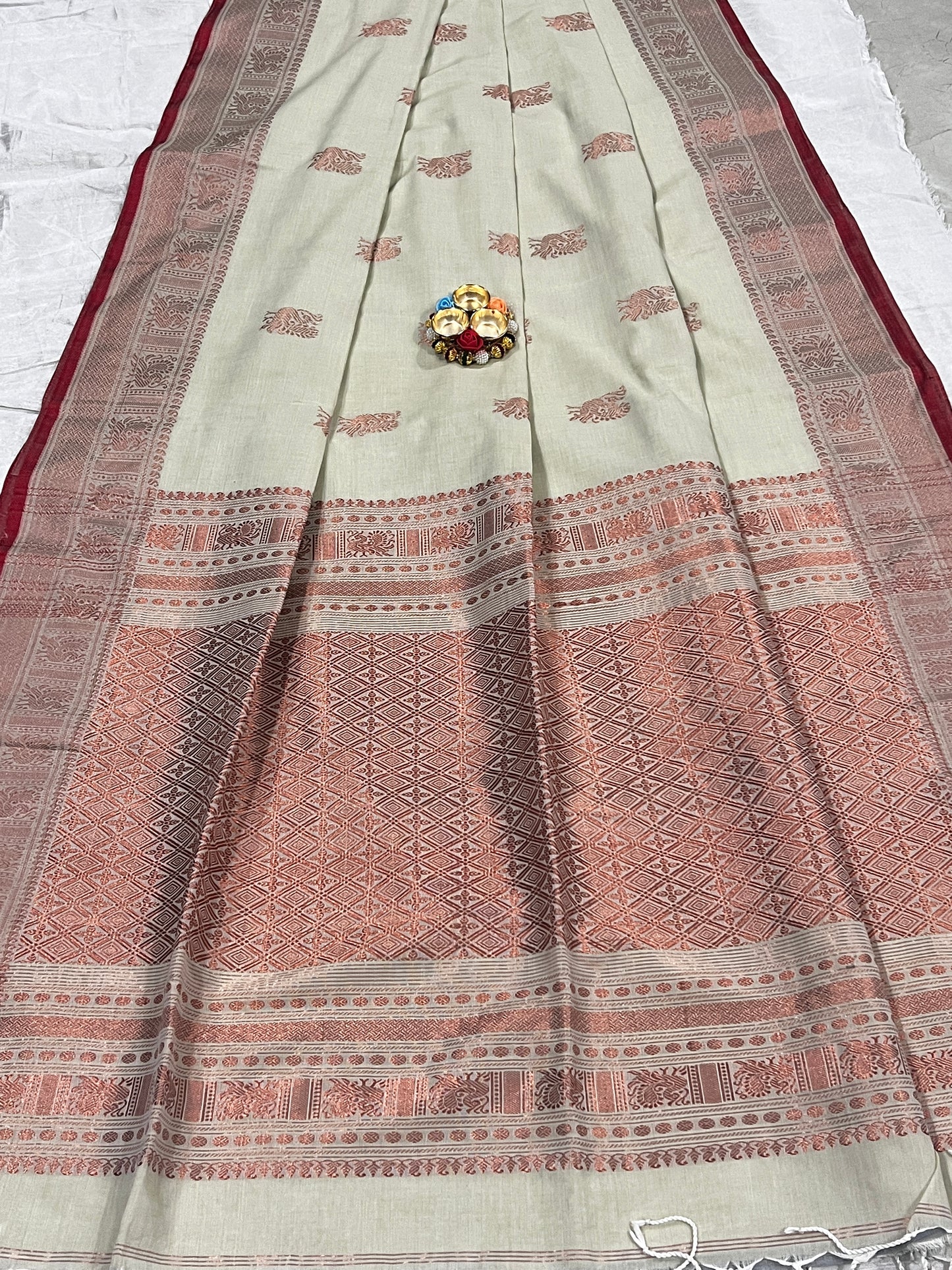 Light pista colour pure Khadi saree with copper zari border and pallu